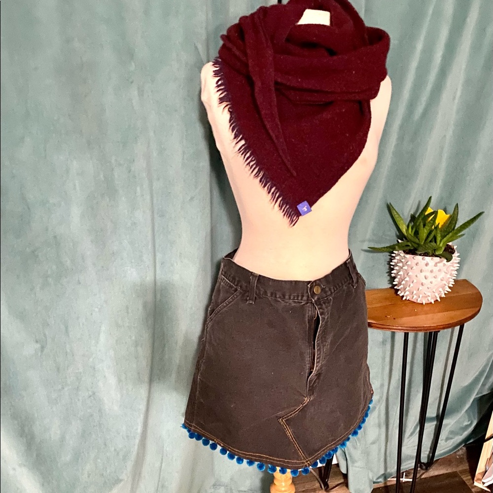 Carheart miniskirt. Handmade from repurposed work pants. Black w/blue pompoms